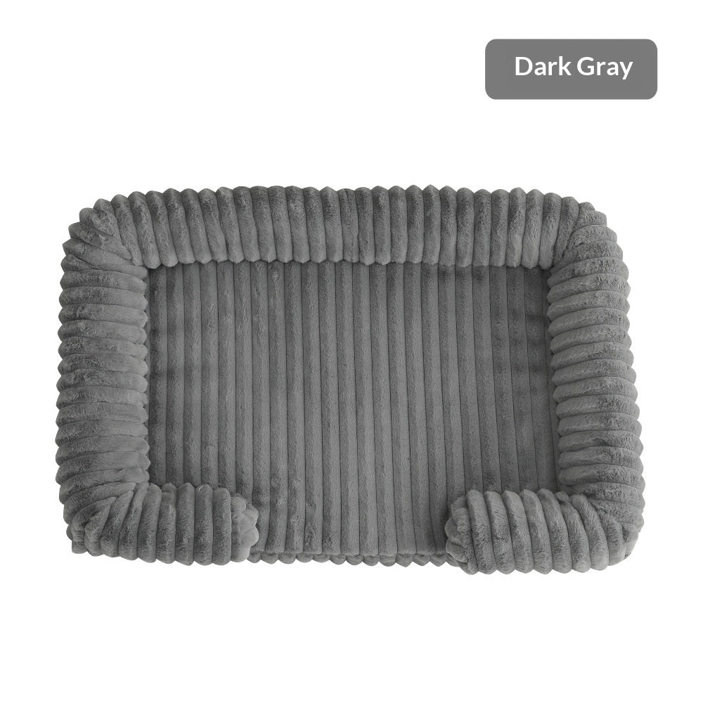 Ultra-Soft Calming Dog Bed in dark gray color with thick cushioned walls for comfort and support.