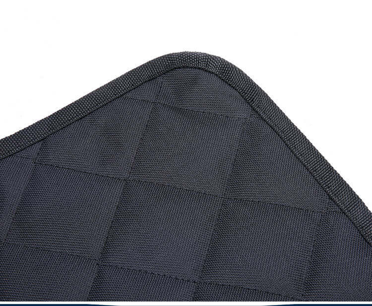 Close-up of the heavy-duty fabric on a waterproof dog car hammock, showcasing durability and design.